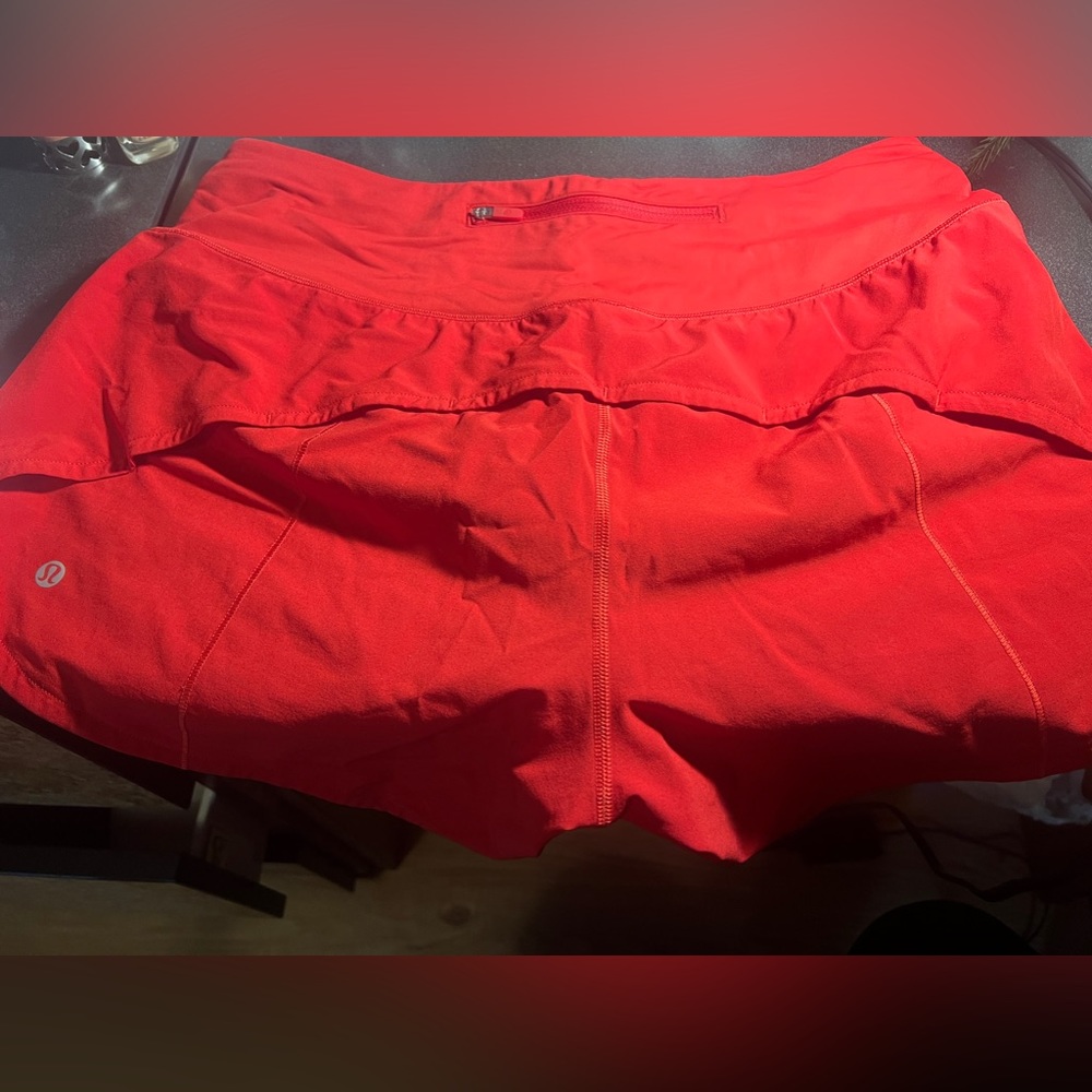 very gently used speed up mid-rise lined short in red !! they’re a size 10!